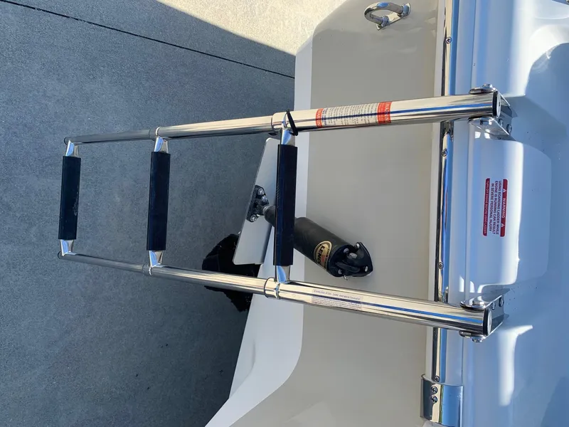 Slide: The Image of Stainless steel swim ladder on 2024 Key West 219 FS boat. - 24