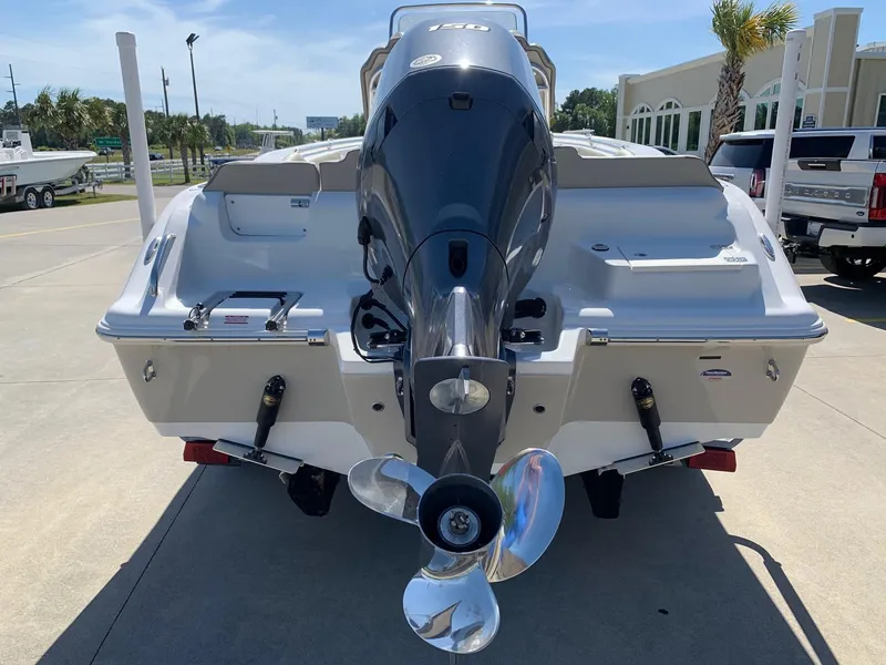 Slide: The Image of 2024 Key West 219 FS boat rear view with outboard motor. - 4