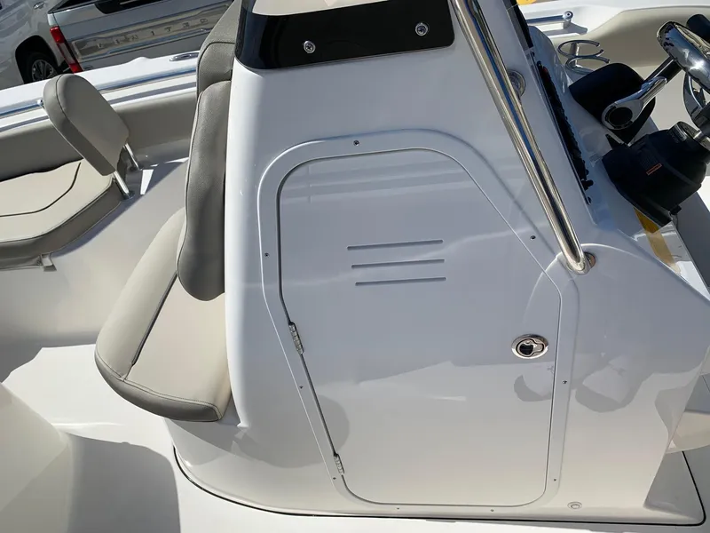 Slide: The Image of 2024 Key West 219 FS boat console and seating area. - 18