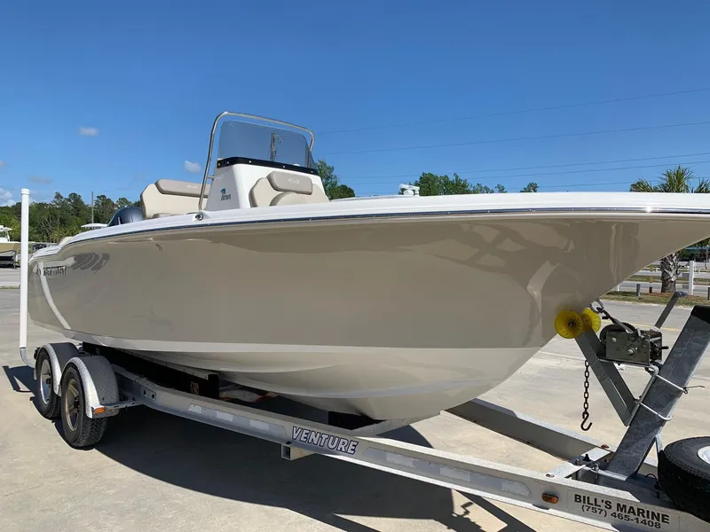 Slide: The Image of 2024 Key West 219 FS boat on a Venture trailer at Bill's Marine. - 2