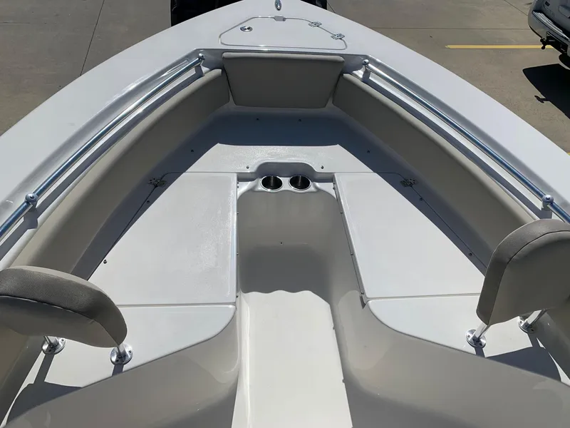 Slide: The Image of 2024 Key West 219 FS boat bow seating area with cup holders. - 23