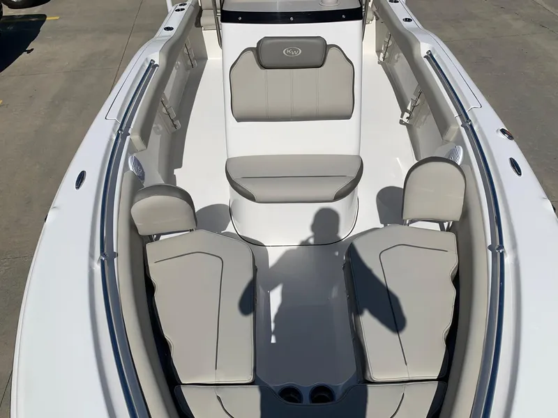 Slide: The Image of 2024 Key West 219 FS boat interior with gray seating and white accents. - 5