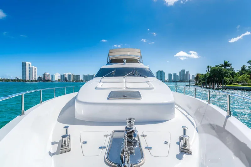 Slide: The Image of 2001 Azimut Sea Jet yacht cruising near city skyline on a sunny day. - 14