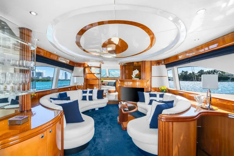 Slide: The Image of Luxurious interior of a 2001 Azimut Sea Jet yacht with elegant seating and panoramic windows. - 2