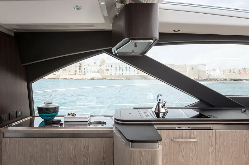 Slide: The Image of Modern kitchen interior of 2023 Azimut S6 Sportfly yacht with ocean view. - 14