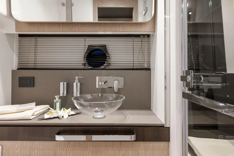 Slide: The Image of Modern bathroom in 2023 Azimut S6 Sportfly yacht with glass sink and sleek fixtures. - 18