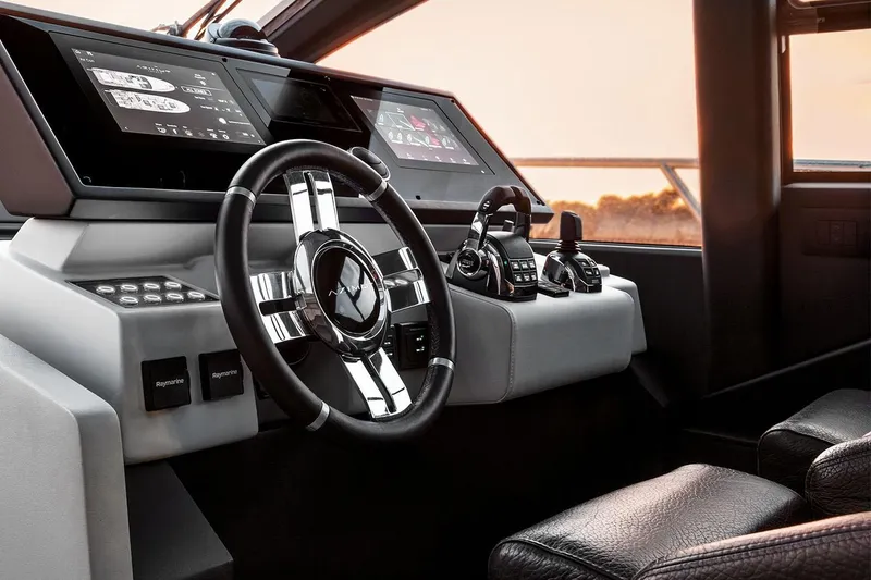 Slide: The Image of 2023 Azimut S6 Sportfly yacht helm with modern controls and sleek design. - 20
