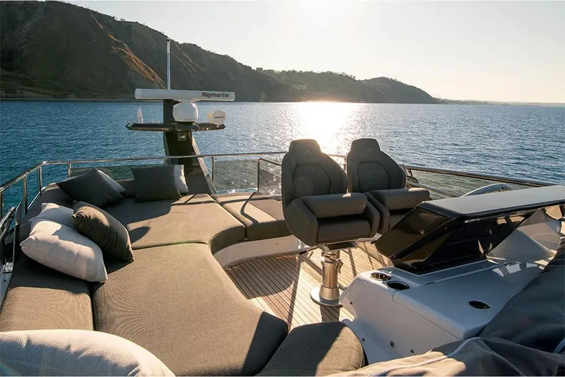 Slide: The Image of Azimut S6 Sportfly 2023 yacht deck with luxurious seating and ocean view. - 5