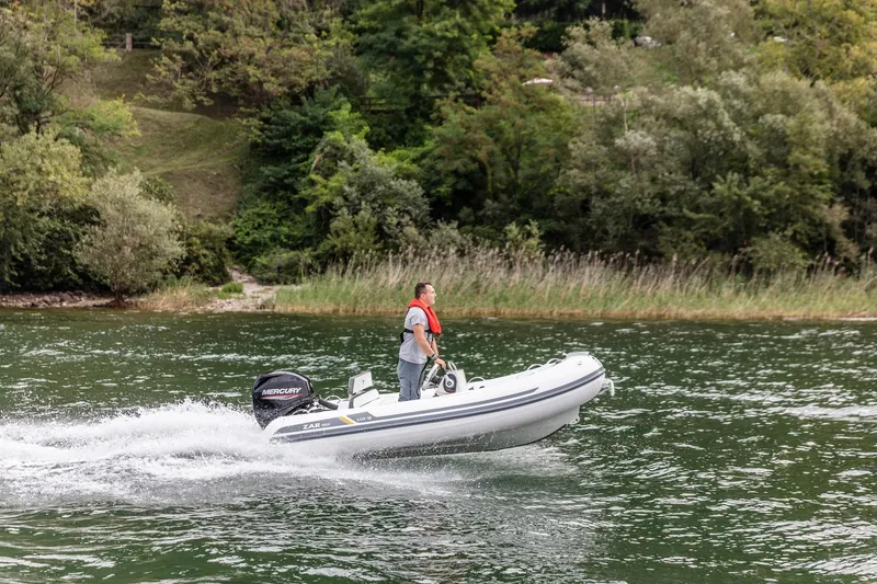The Image of 2023 ZAR Mini LUX 12 inflatable boat on a lake. - 0