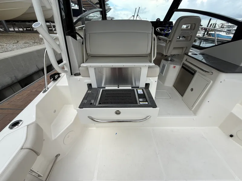 Slide: The Image of Boston Whaler 325 Conquest 2027 - 29