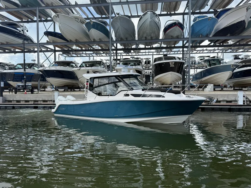 Slide: The Image of Boston Whaler 325 Conquest 2027 - 1
