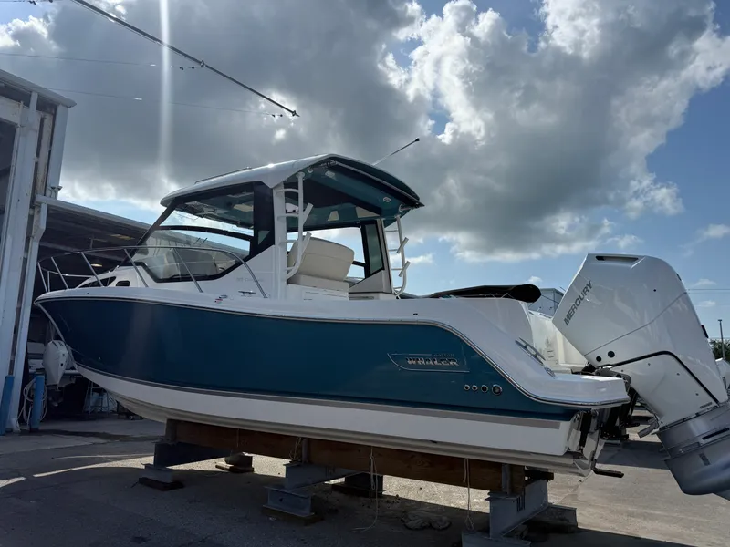 Slide: The Image of Boston Whaler 325 Conquest 2027 - 4