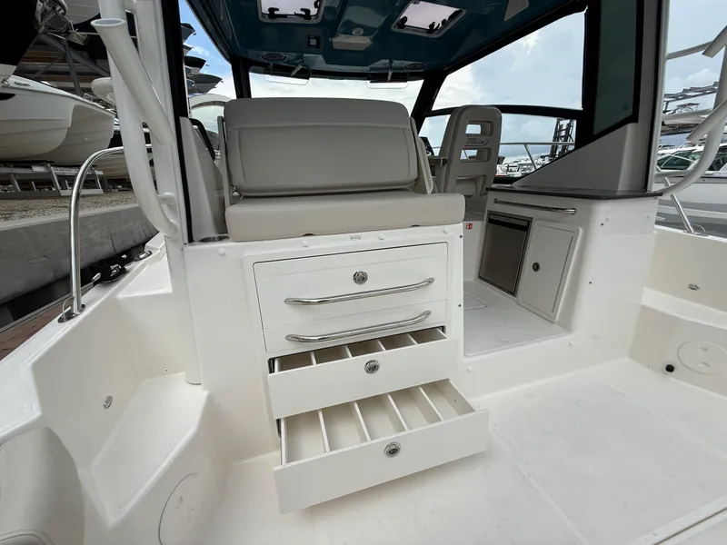 Slide: The Image of Boston Whaler 325 Conquest 2027 - 31