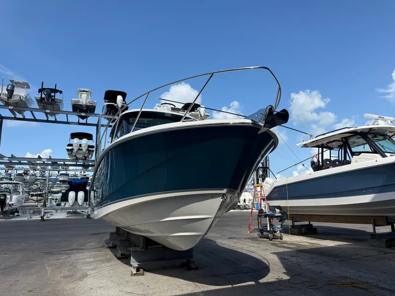 Slide: The Image of Boston Whaler 325 Conquest 2027 - 2