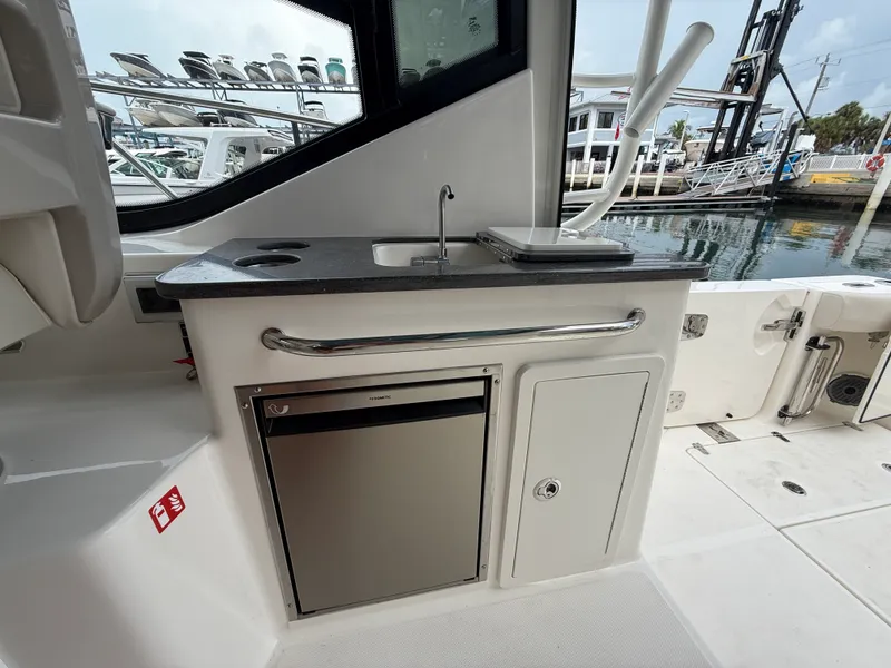 Slide: The Image of Boston Whaler 325 Conquest 2027 - 24