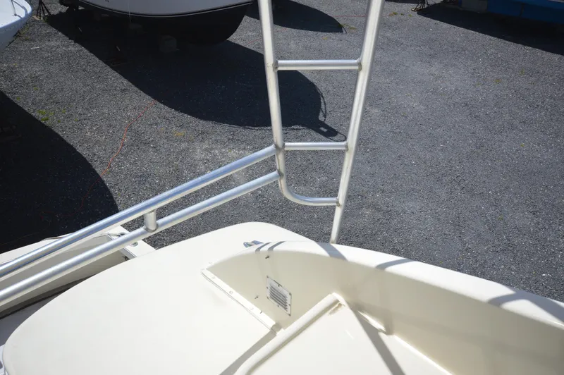 Slide: The Image of Close-up of the deck and ladder of a 1961 Hatteras 41 Convertible boat. - 14