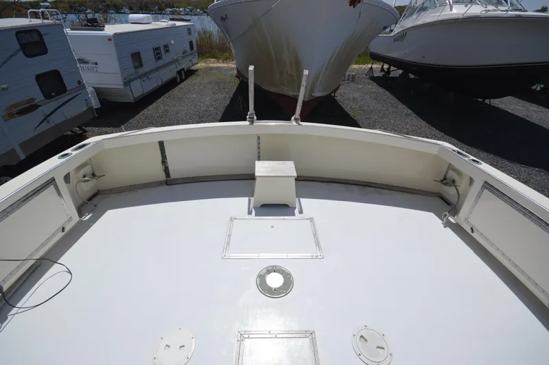 Slide: The Image of 1961 Hatteras 41 Convertible boat deck in storage yard. - 16
