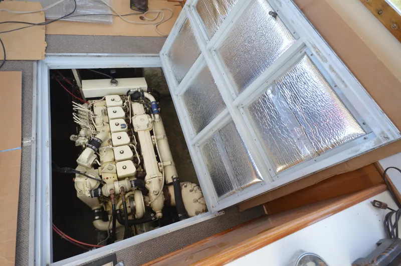 Slide: The Image of Engine compartment of a 1961 Hatteras 41 Convertible boat. - 27