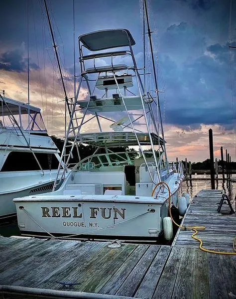 Slide: The Image of 1996 Hatteras SPORTFISH EXPRESS docked at sunset, Quogue, NY. - 2