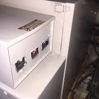 Slide: The Image of Electrical panel on a 1996 Hatteras SPORTFISH EXPRESS boat. - 26