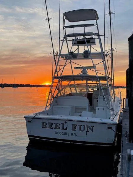 Slide: The Image of 1996 Hatteras SPORTFISH EXPRESS boat docked at sunset, "Reel Fun" in Quogue, N.Y. - 30