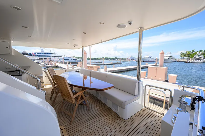 Slide: The Image of Luxurious 2013 Ocean Alexander Sky Lounge yacht deck with seating, overlooking marina. - 2
