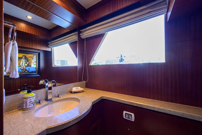 Slide: The Image of Luxurious bathroom interior of 2013 Ocean Alexander Sky Lounge yacht with elegant wood finish. - 24