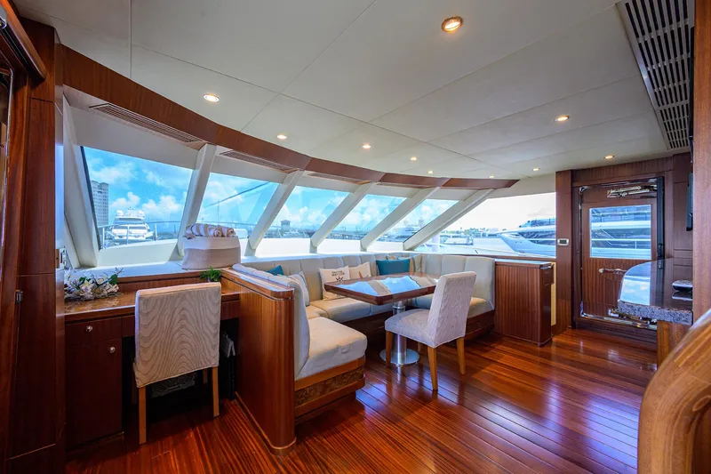 Slide: The Image of Luxurious interior of 2013 Ocean Alexander Sky Lounge yacht with elegant wood finishes and panoramic windows. - 31