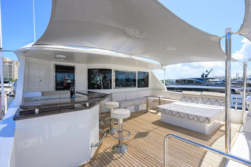 Slide: The Image of Luxurious 2013 Ocean Alexander Sky Lounge yacht with elegant seating and bar area. - 37