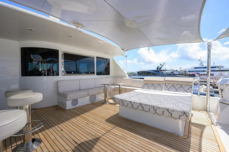 Slide: The Image of Luxurious 2013 Ocean Alexander Sky Lounge yacht interior with elegant seating and scenic marina view. - 39