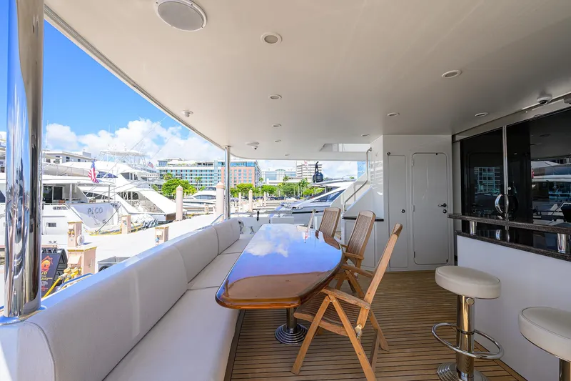 Slide: The Image of Luxurious 2013 Ocean Alexander Sky Lounge yacht deck with seating and marina view. - 4