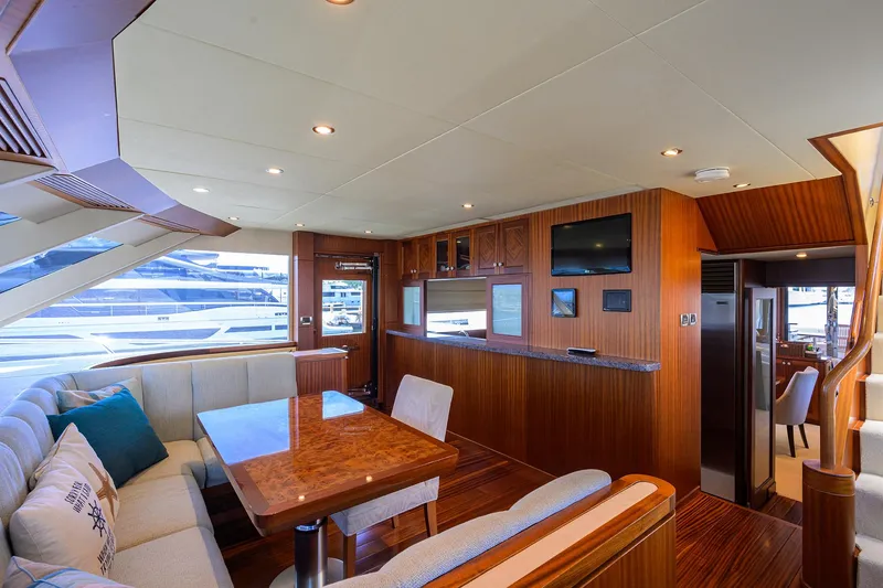 Slide: The Image of Luxurious interior of 2013 Ocean Alexander Sky Lounge yacht with elegant wood finishes and seating area. - 46