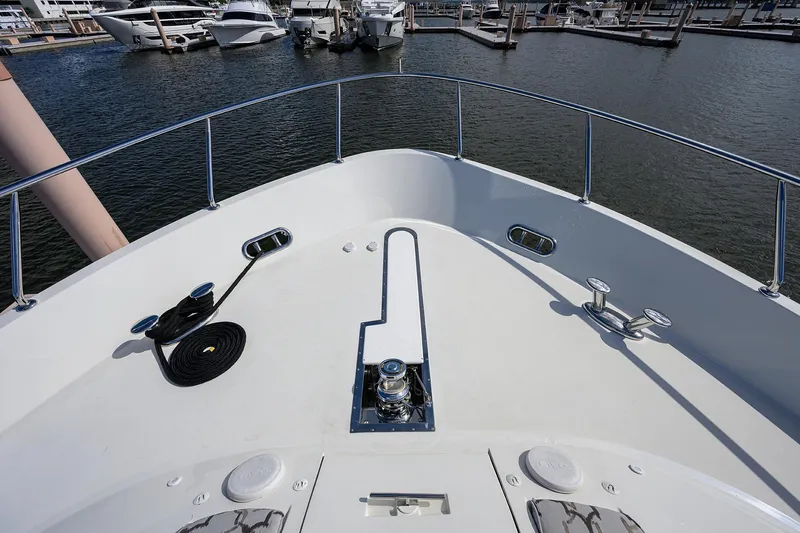 Slide: The Image of Bow view of 2013 Ocean Alexander Sky Lounge yacht docked at marina. - 61