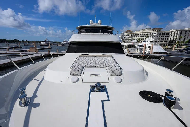 Slide: The Image of 2013 Ocean Alexander Sky Lounge yacht docked at marina under blue sky. - 65