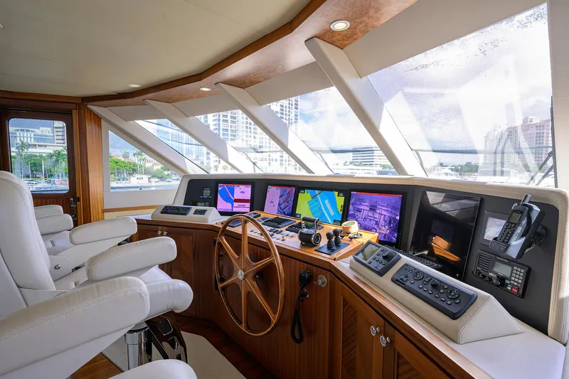 Slide: The Image of Luxurious 2013 Ocean Alexander Sky Lounge yacht helm with advanced navigation systems. - 78