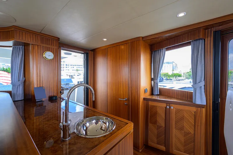 Slide: The Image of Luxurious interior of 2013 Ocean Alexander Sky Lounge yacht with wood finishes and modern amenities. - 94