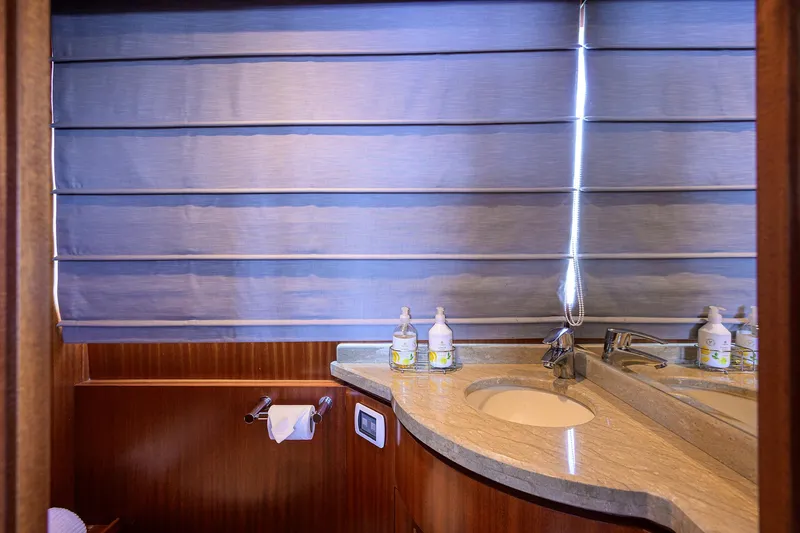 Slide: The Image of Luxurious bathroom in 2013 Ocean Alexander Sky Lounge yacht with elegant fixtures and modern design. - 99