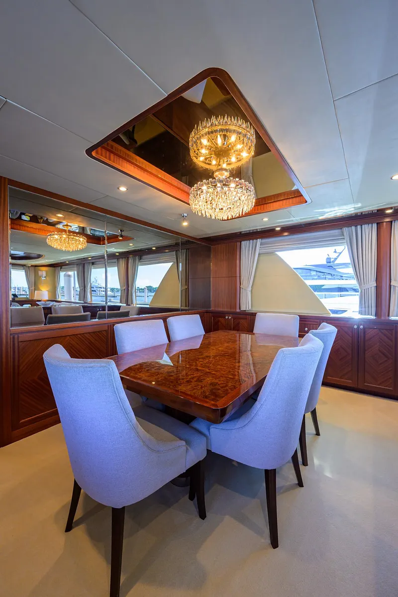 Slide: The Image of Luxurious dining area on 2013 Ocean Alexander Sky Lounge yacht with elegant chandelier. - 51