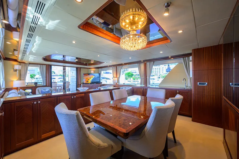 Slide: The Image of Luxurious interior of 2013 Ocean Alexander Sky Lounge yacht with elegant dining area and chandelier. - 54