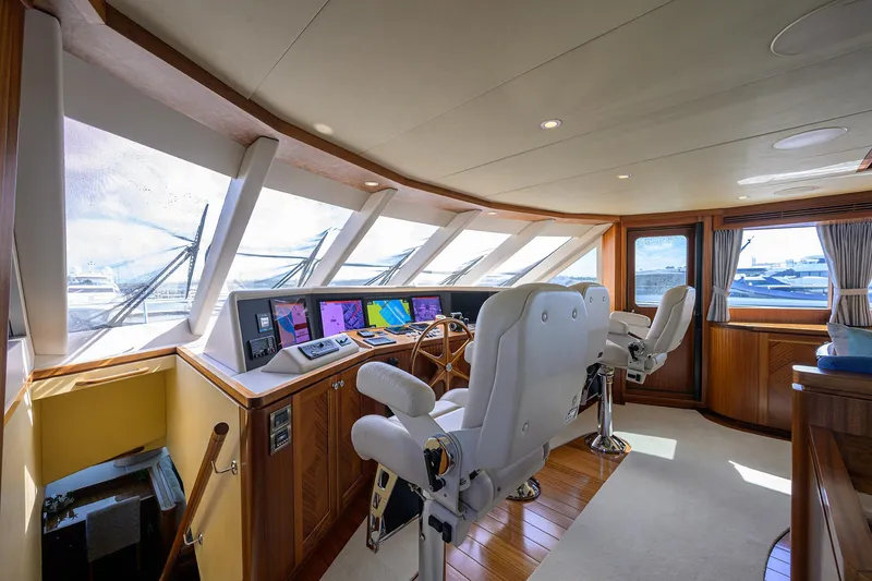Slide: The Image of Luxurious 2013 Ocean Alexander Sky Lounge yacht interior with helm and panoramic windows. - 63