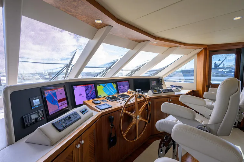 Slide: The Image of Luxurious 2013 Ocean Alexander Sky Lounge yacht interior with advanced navigation controls. - 68