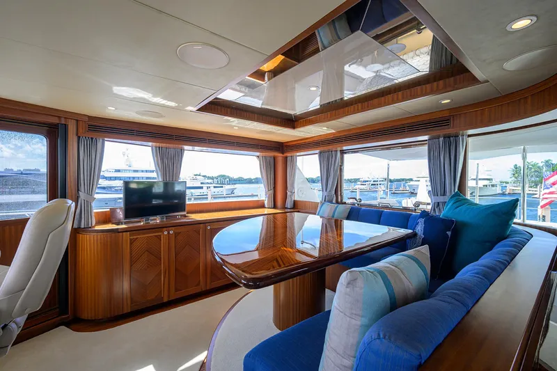 Slide: The Image of Luxurious 2013 Ocean Alexander Sky Lounge interior with elegant wood finishes and panoramic windows. - 86