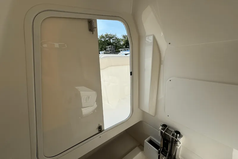 Slide: The Image of Boston Whaler 330 Outrage 2026 - 26