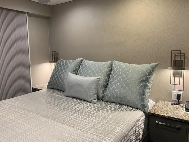 Slide: The Image of Modern bedroom interior in Adonia Harmony Share 2, 2020 model, featuring elegant bedding and ambient lighting. - 9