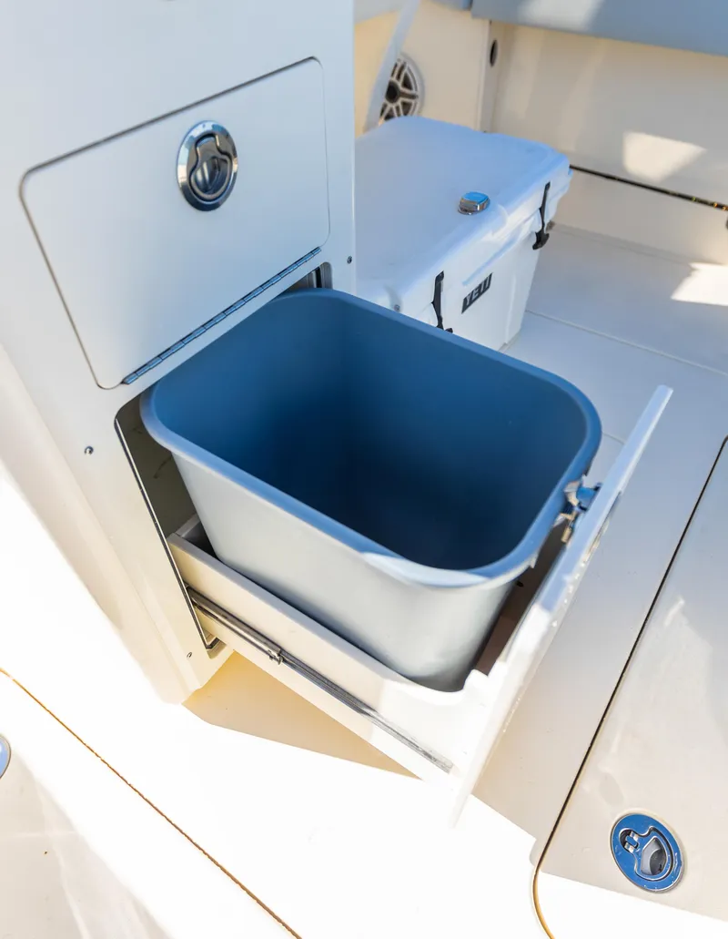 Slide: The Image of Scout 260 LXF 2026 with pull-out trash bin onboard. - 12