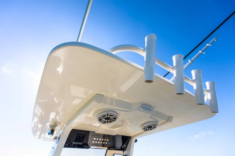 Slide: The Image of Scout 260 LXF 2026 boat roof with fishing rod holders. - 16