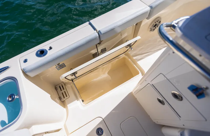 Slide: The Image of Interior view of 2026 Scout 260 LXF boat with storage compartment. - 20
