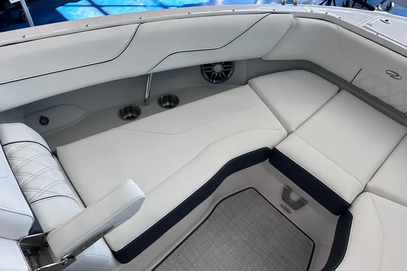 Slide: The Image of Luxurious interior of 2026 Regal LX6 boat with plush seating and modern design. - 27
