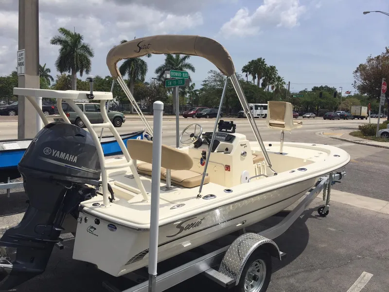 Slide: The Image of 2025 Scout 177 Sport boat with Yamaha outboard motor on trailer. - 5