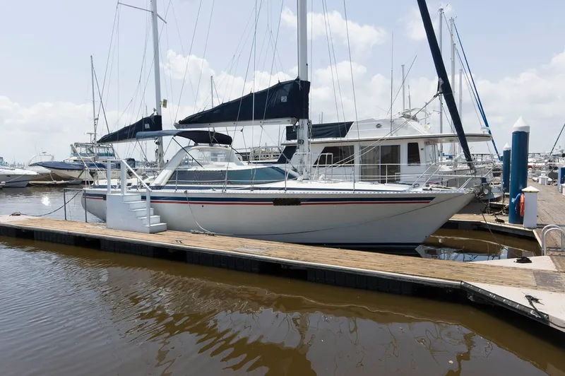 The Image of 1984 Jouet 1280 sailboat docked at marina. - 0